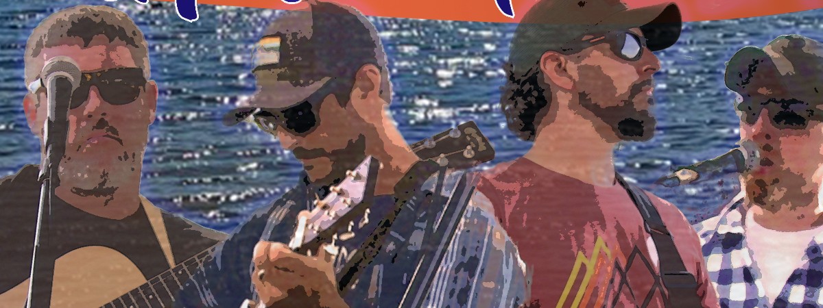 A band plays guitars in front of a sparkling lake