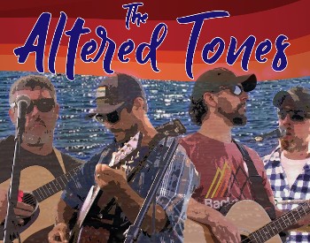 A band plays guitars in front of a sparkling lake