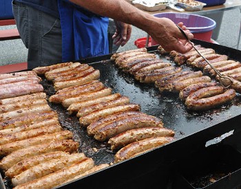 Local farm-to-table sausages on the grill!