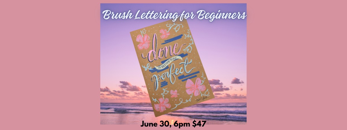 Pink background with pink sunset in background and a book that is hand lettered "Done is better than perfect"