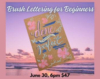 Pink background with pink sunset in background and a book that is hand lettered "Done is better than perfect"