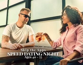 Singles participating in a speed dating event for ages 40-55 at Artisanal Brew Works in Saratoga Springs NY