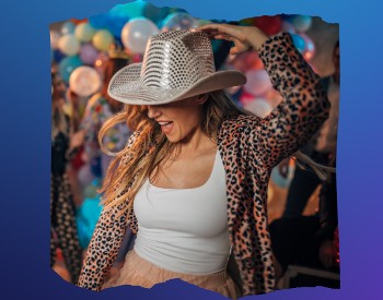 Woman in cowboy hat dancing