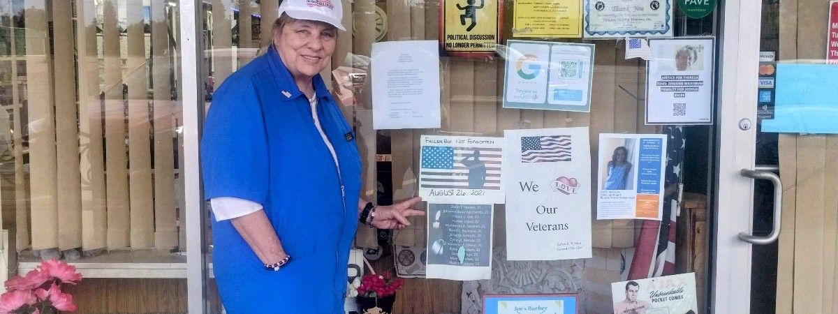 Donna Outside Barber Shop
