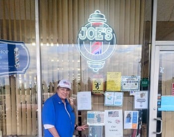 Donna Outside Barber Shop