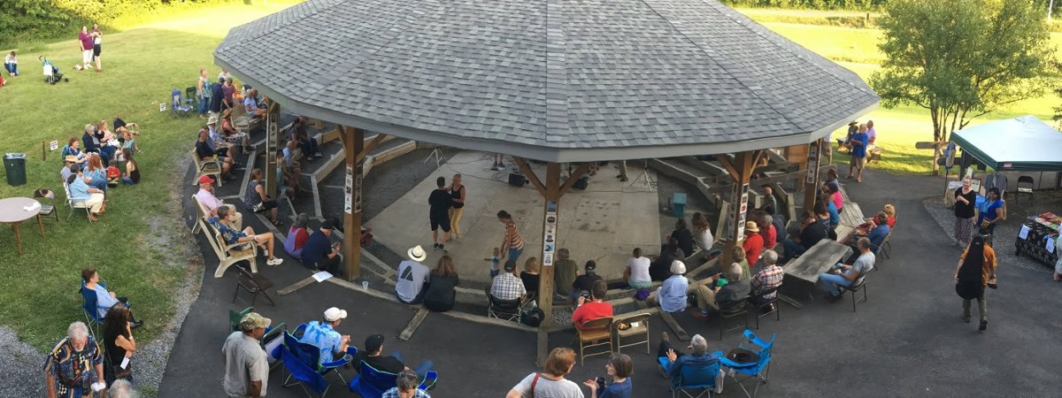 group under a large gazebo for an event