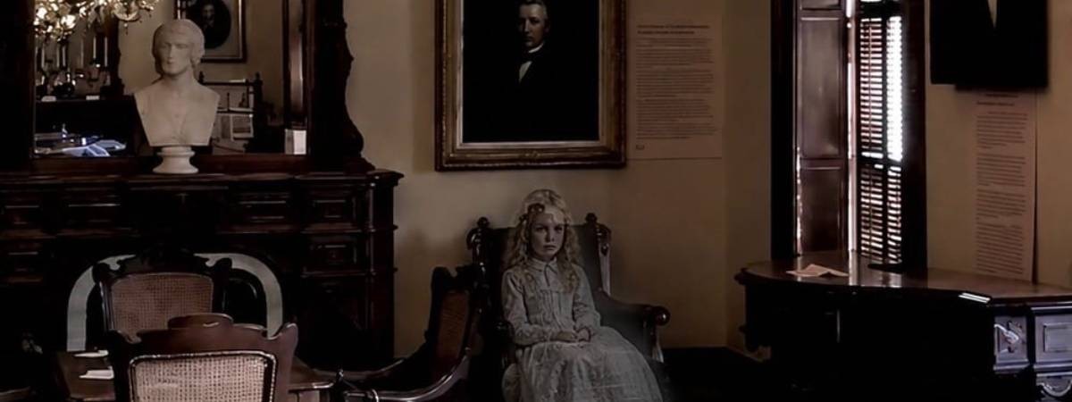 ghost sits in chair