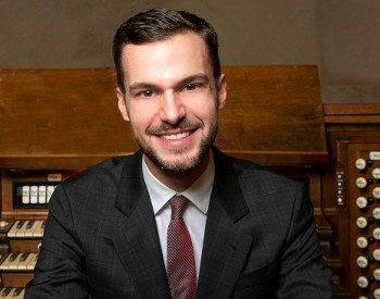 Banner for the Beeman Organ Concert on Friday, October 2 at 7:30 p.m., featuring organist Nathan Laube. Photo of Laube smiling at an organ console. First Presbyterian Church of Glens Falls Concerts logo.