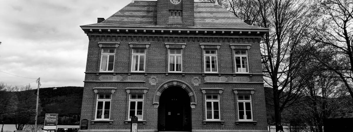 black and white image of old country courthouse