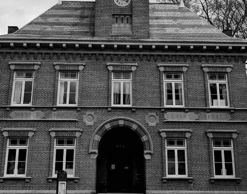 black and white image of old country courthouse
