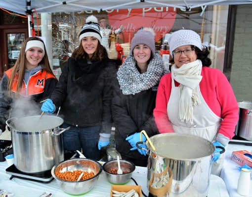 four women at Chowderfest table