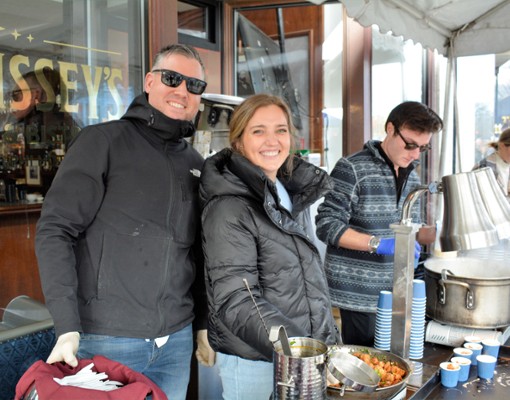 group of people at a chowder station