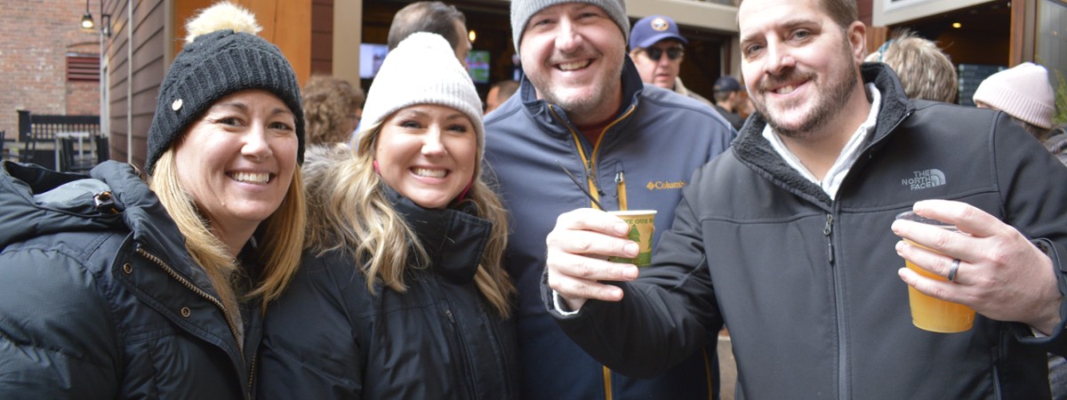 two men and two women with chowder samples