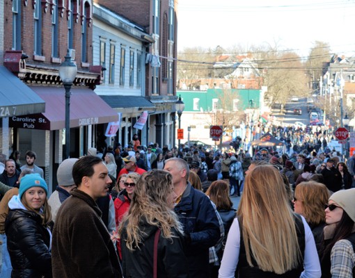 crowd of people at an event in a city