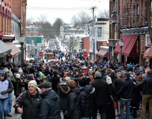 a crowd of people in a city