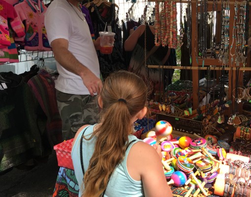 little girl at vendor booth