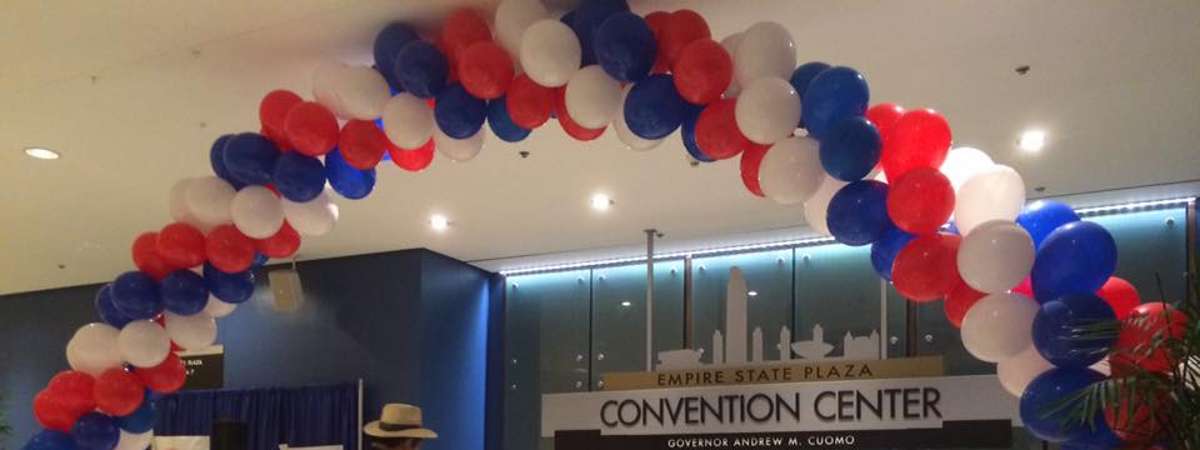 balloons surrounding a convention center door