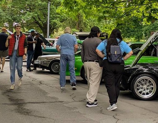 people look at cars
