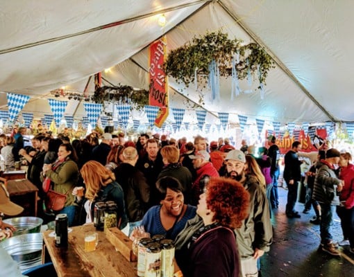 people at oktoberfest tent