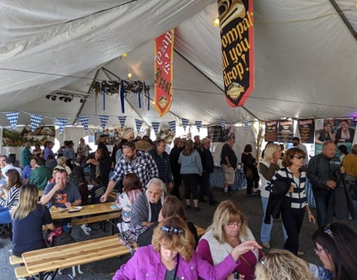people at oktoberfest tent