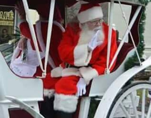 santa in an enclosed carriage