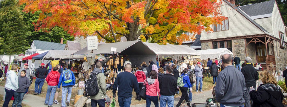 garage sale attendees and fall foliage