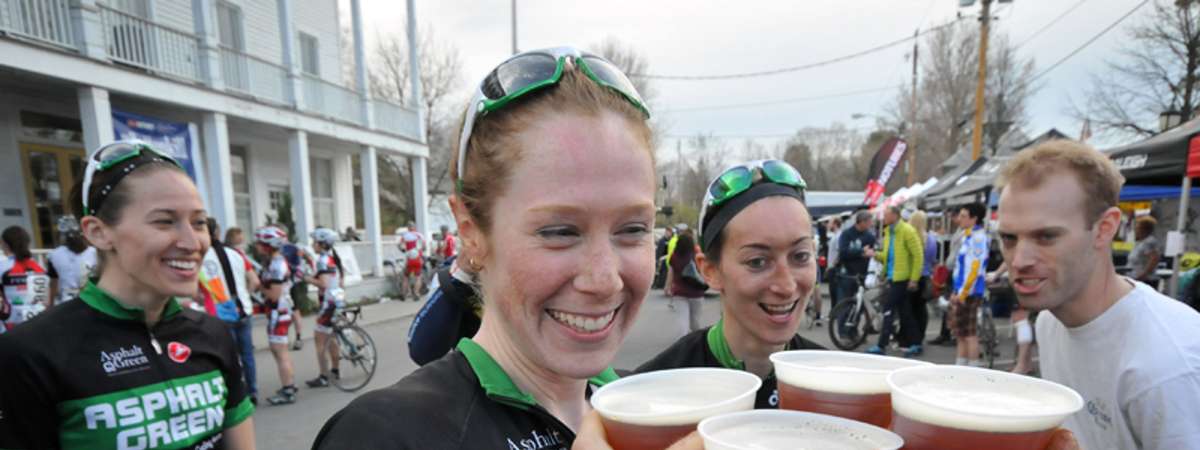 cyclists accepting beer