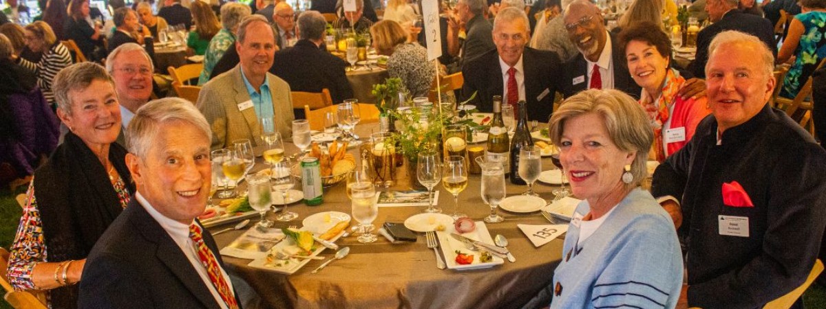 people seated at tables during a gala