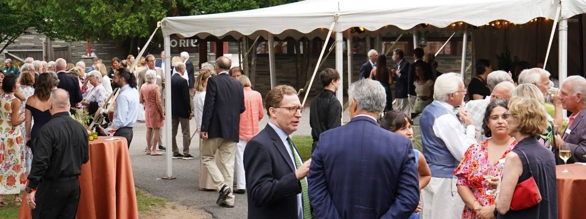people outdoors at a gala
