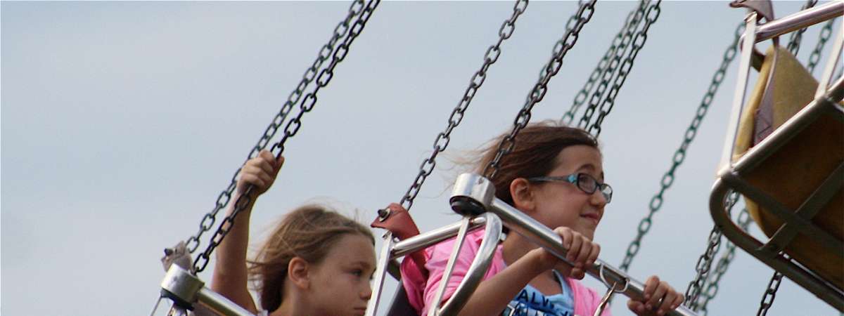 kids on a swing ride