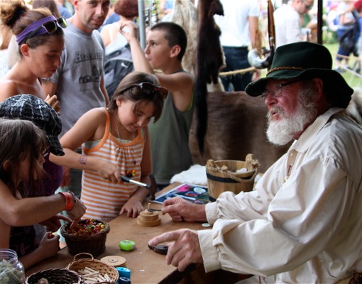 people at a vendor table