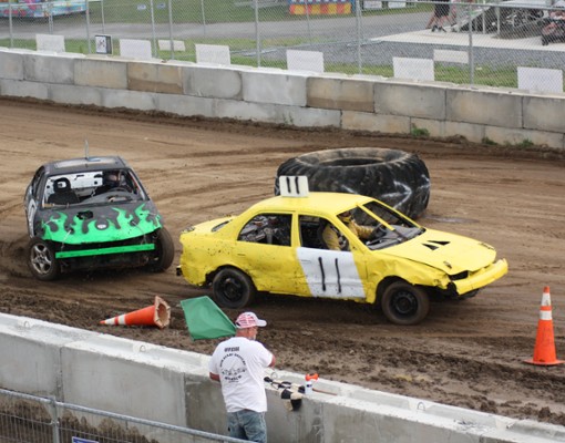 cars on a dirt road
