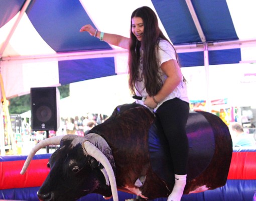 girl riding bull