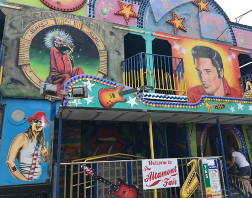 a large structure with musician faces on it