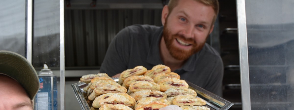man with try of Oktoberfest food
