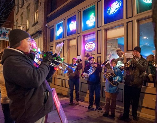 people playing instruments outside