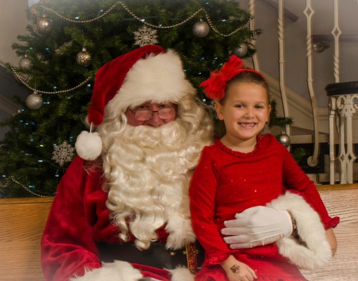 young girl with santa claus