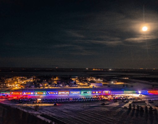 canadian pacific holiday train lit up at night