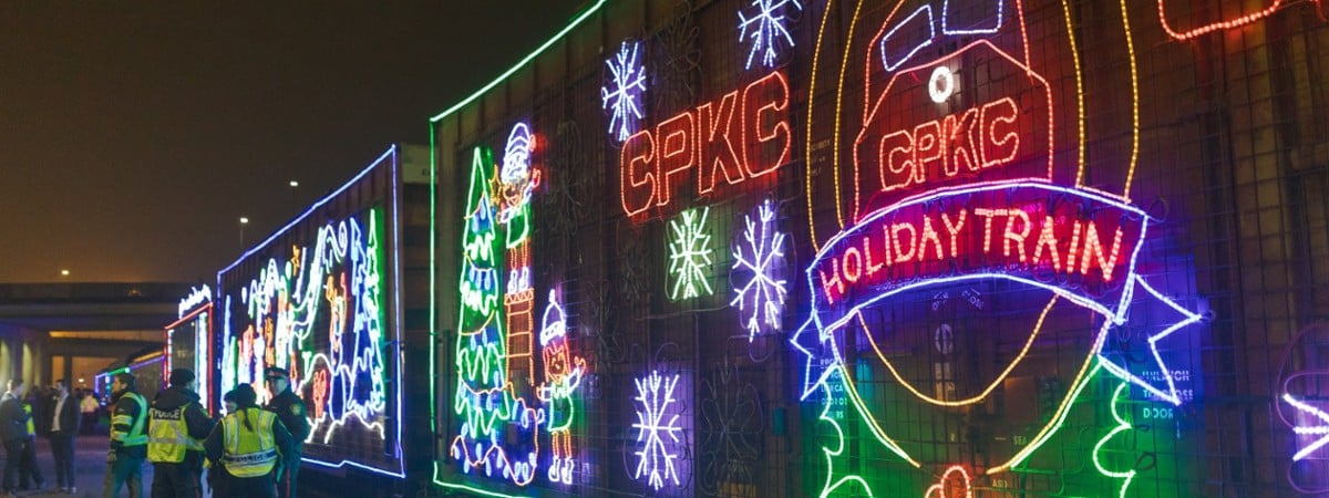 canadian pacific holiday train lit up at night