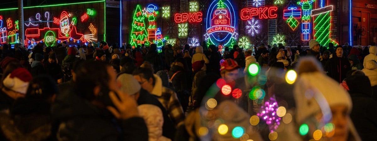 canadian pacific holiday train lit up at night