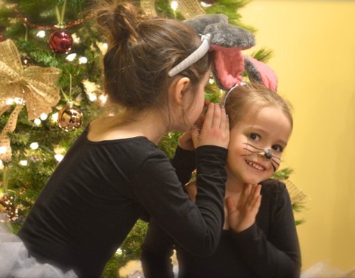 two girls dressed as mice for the holidays