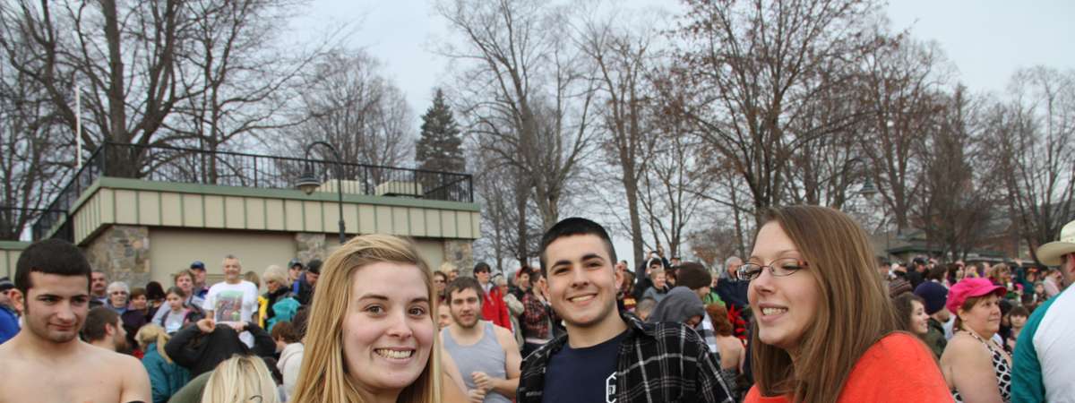 three people smiling