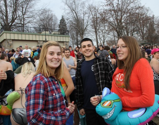 three people smiling