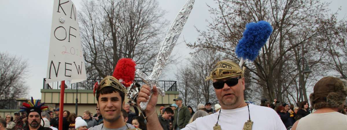 men dressed as knights before a polar plunge