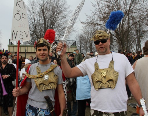 men dressed as knights before a polar plunge