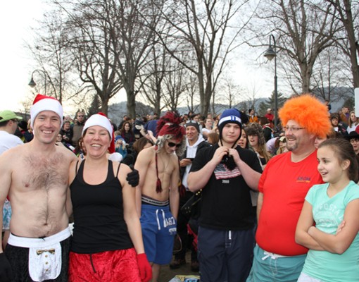 crowd of people dressed up for a fun polar plunge event
