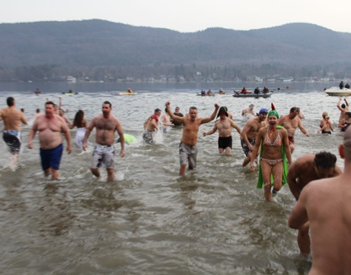 crowd of people in a cold lake