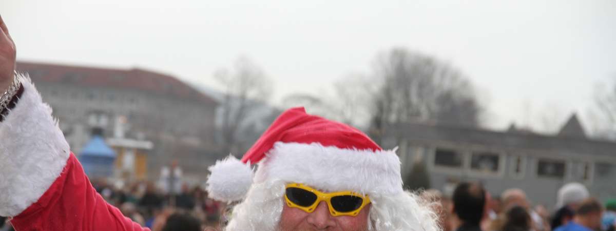 man dressed as santa with sunglasses