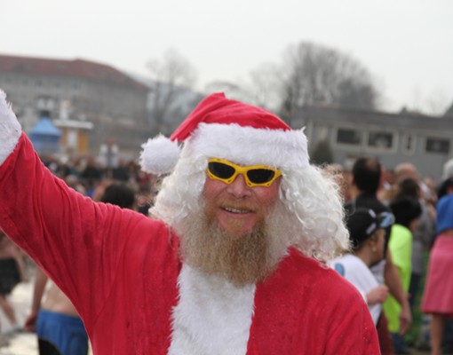 man dressed as santa with sunglasses
