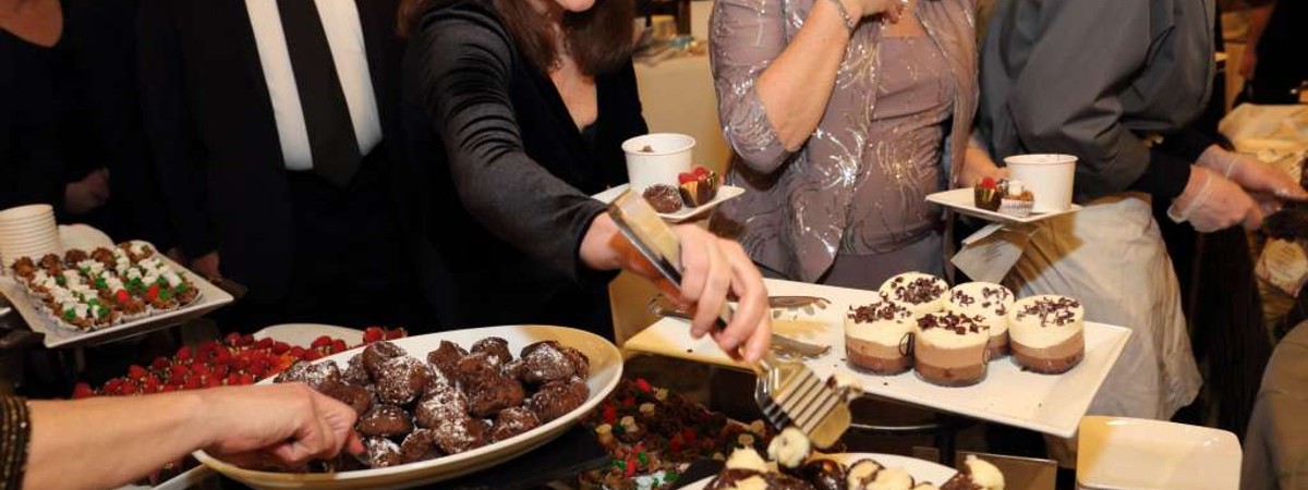 Guests Enjoying Array of Chocolate Desserts